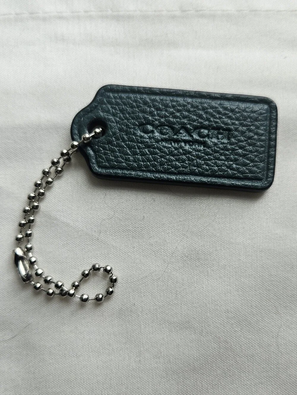 Coach embossed chain dark
